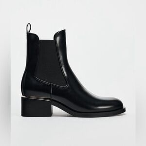NWT. Zara Black Faux Leather Ankle Boots with Metallic Plate. Size 10.
